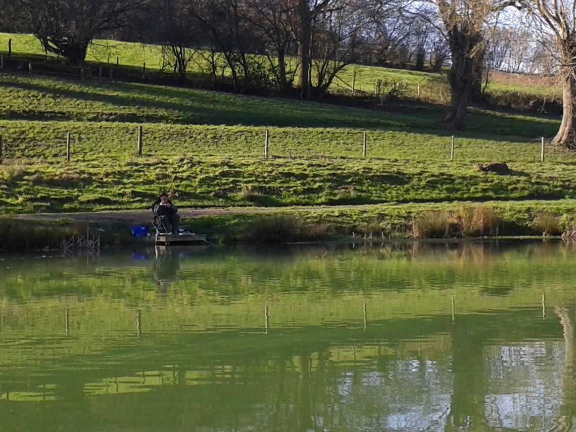 Dad catching perch at Harescombe Fishery Meadow Lake