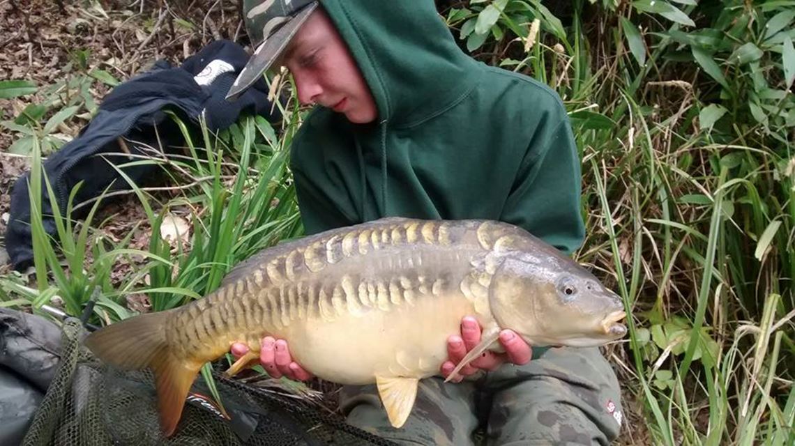 Luke Taylor with a Mirror Carp from Shearwater